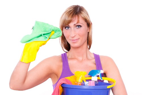 Carpet cleaning technician preparing equipment for a safe Kensington cleaning service