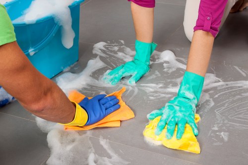 Office cleaning team preparing a Kensington workplace reception area