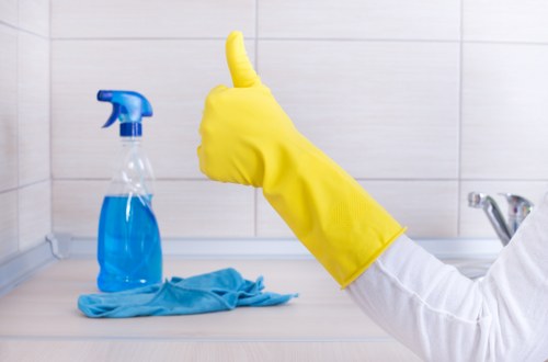 Cleaner preparing a Kensington property for a one-off deep clean