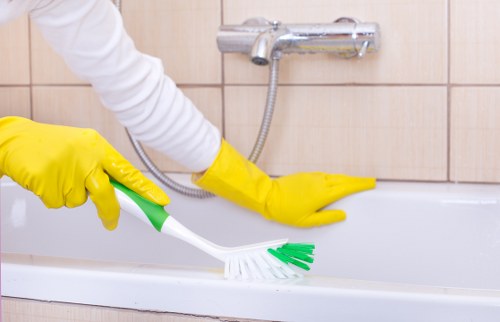 Local carpet cleaner treating stains in a Kensington flat